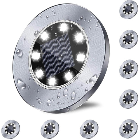 Rayolon 8-LED solar ground light brightening pathways at night.