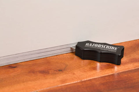 RazorScribe Pro stud finder shows accurate locations for quick mounting.