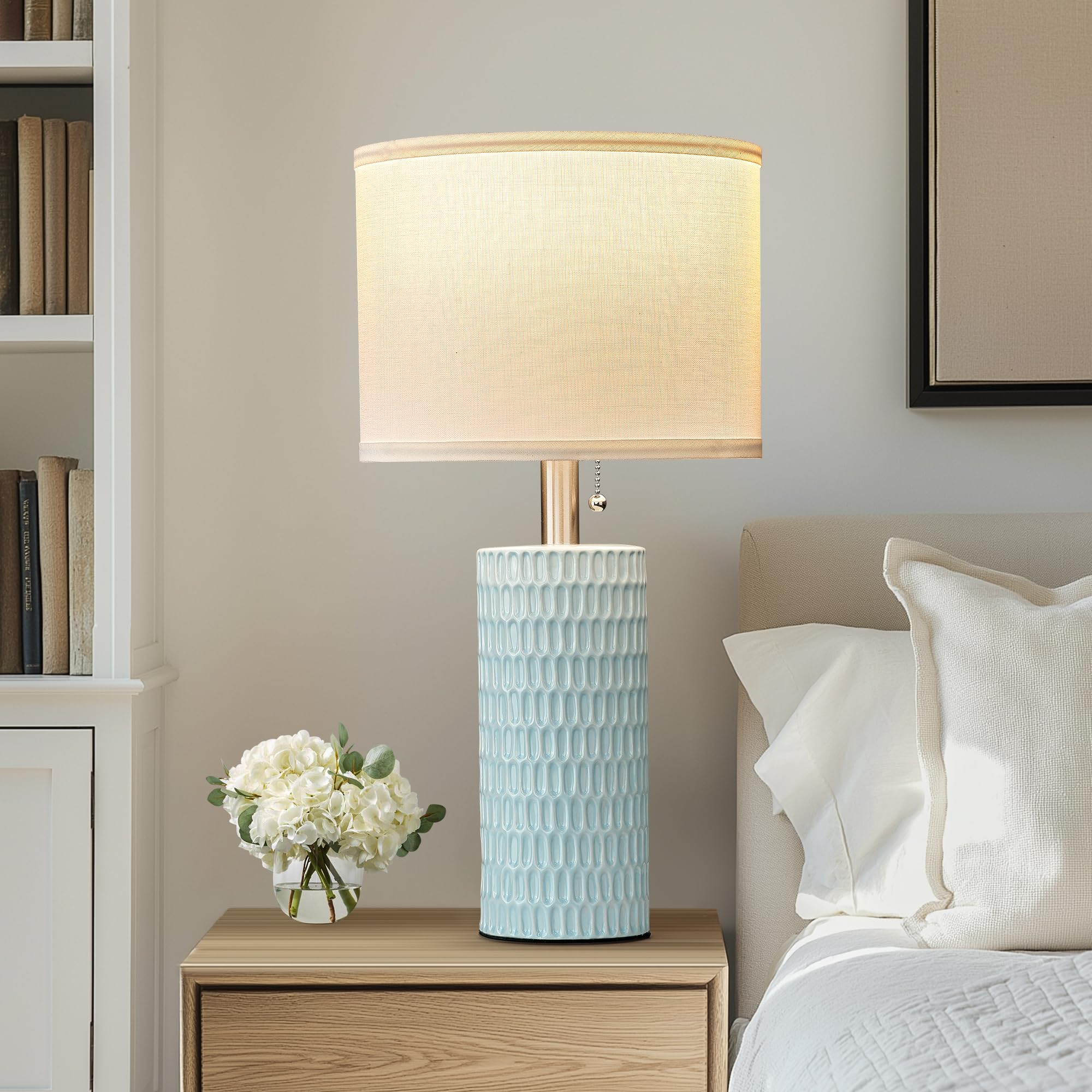 Reaketon blue ceramic-base table lamps with fabric shade for warm evenings.