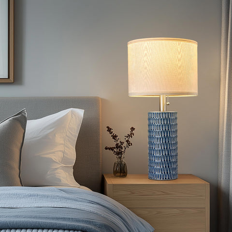 Reaketon table lamp with fabric shade and warm light for cozy evenings