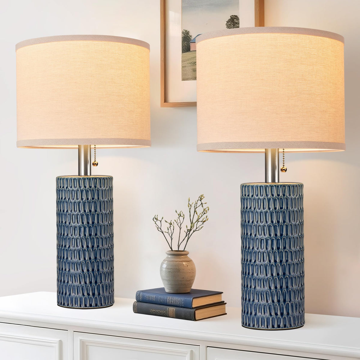 Reaketon pair of blue modern ceramic table lamps for a calm bedroom setting.