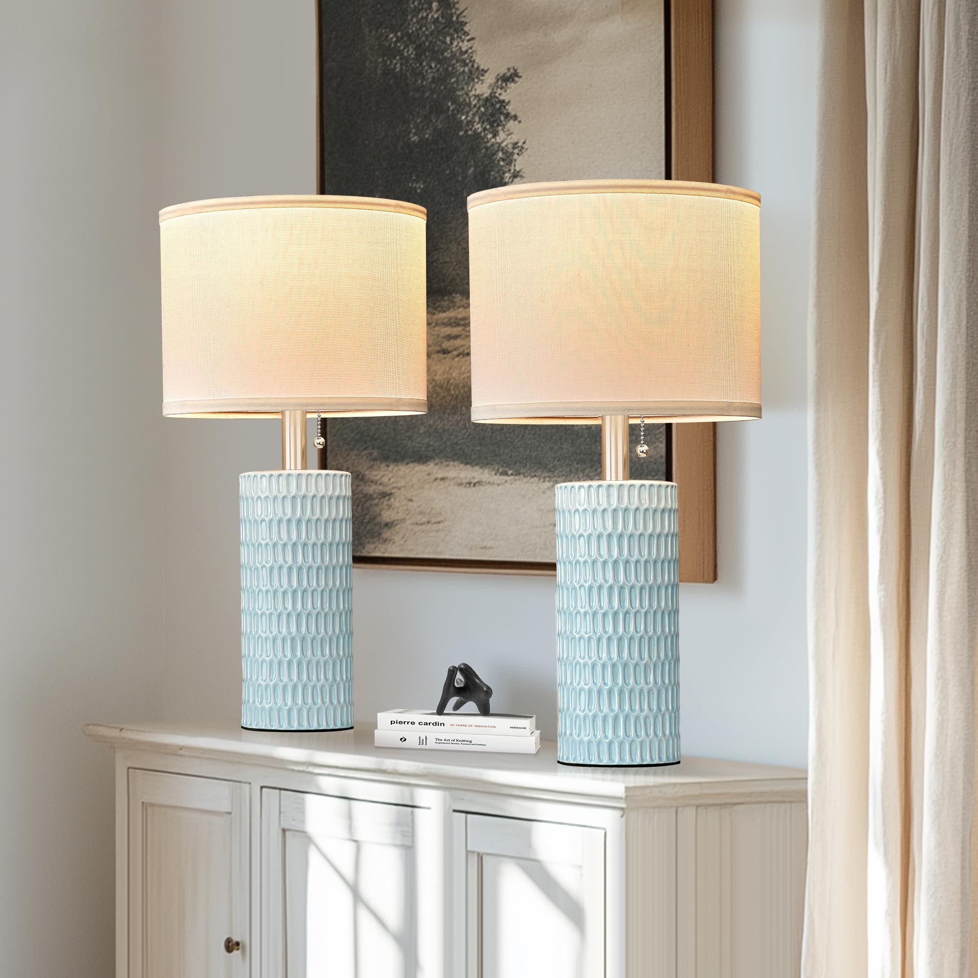 Reaketon pull-chain blue table lamps add elegant bedside convenience.