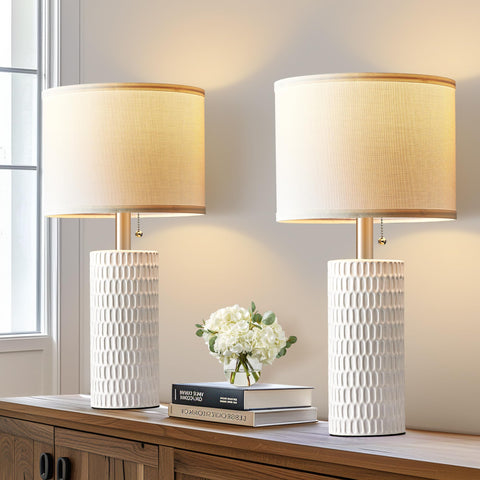 White farmhouse-style bedroom lamps adding warm ambiance to living spaces.