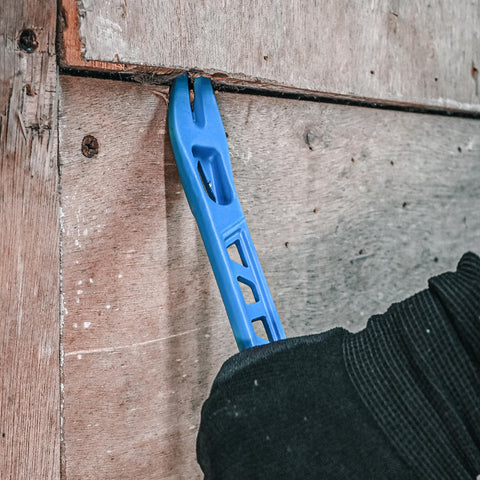 Real Steel 10-inch nail puller in a workspace showing reach into tight spaces.