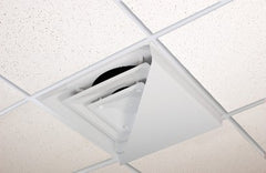 Receilit corner air diverter triangle on a 2x2 diffuser for targeted airflow.