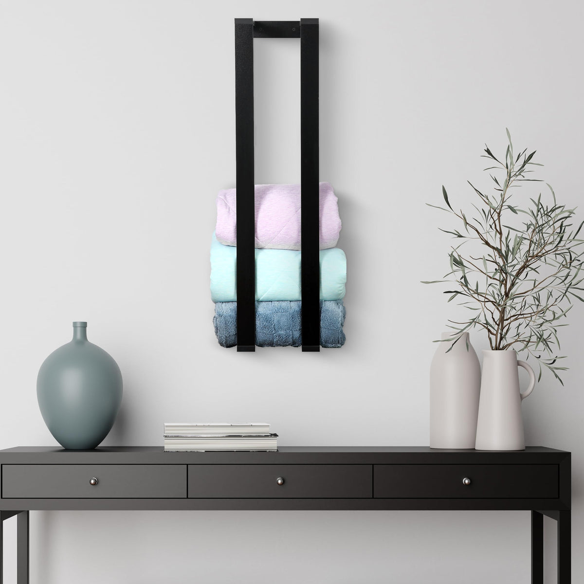 RELODECOR blanket wall rack and floating shelf keeps blankets accessible for easy reach