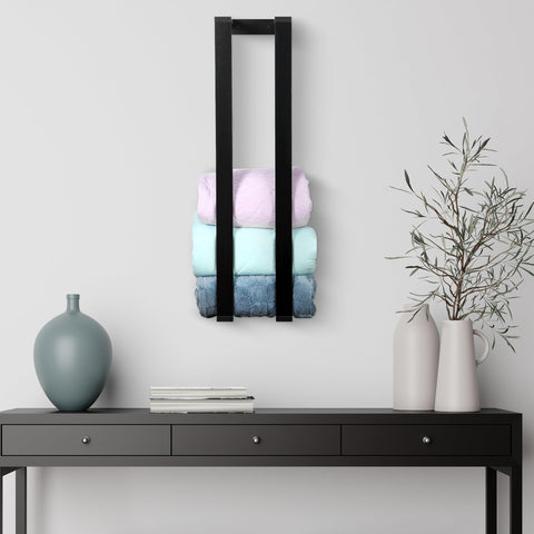 RELODECOR blanket wall rack and floating shelf keeps blankets accessible for easy reach
