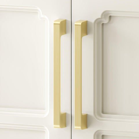 Rergy gold brushed-brass drawer pulls elevate cabinetry style.