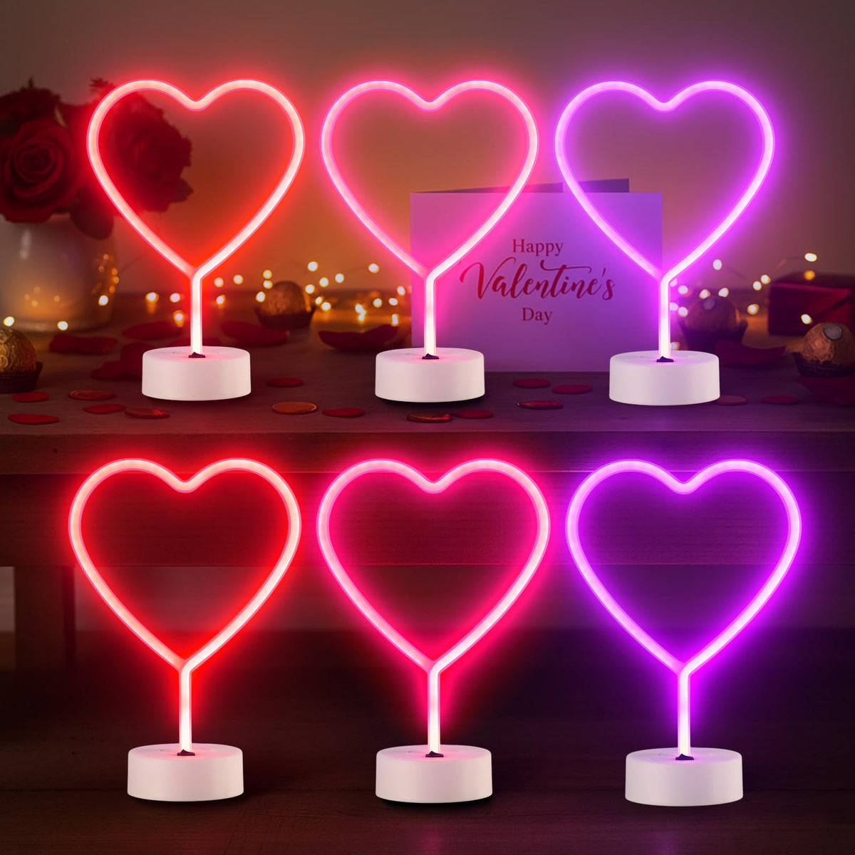 Retisee heart neon signs set in red, pink, and purple for romantic ambiance.