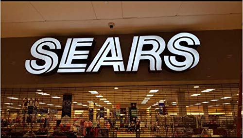 Signage application with Rextin modules on windows or walls.