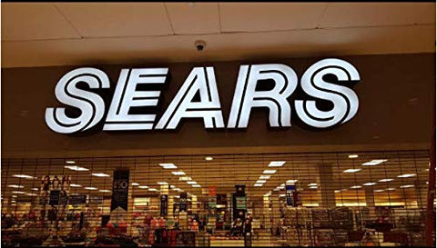 Signage application with Rextin modules on windows or walls.