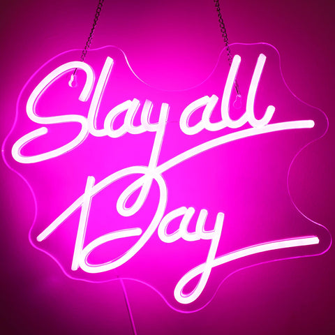 ReyeeInc Slay All Day pink neon sign decorates dorm rooms with vibrant mood lighting.