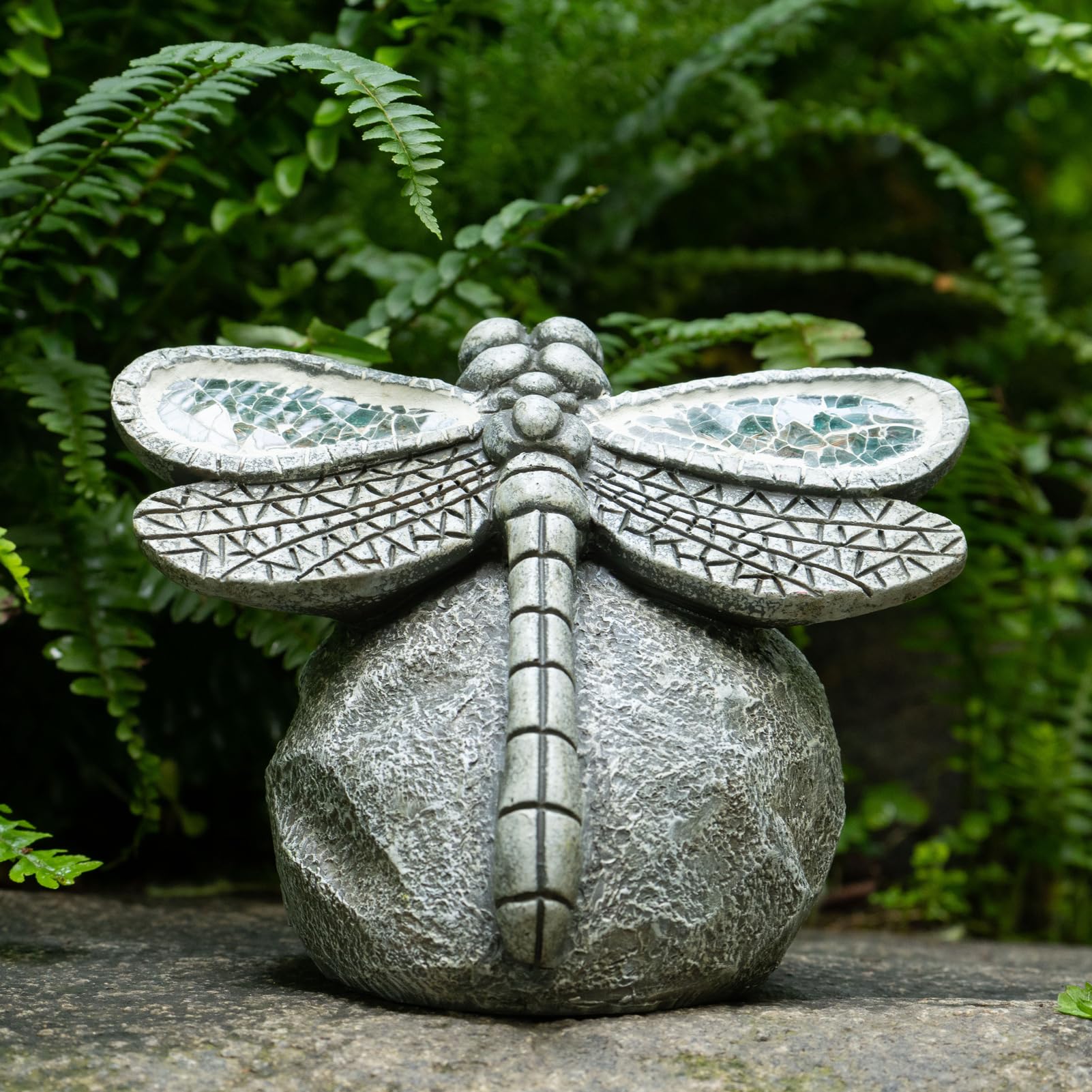 Rezpuao outdoor dragonfly decor glows softly along pathways after dark.