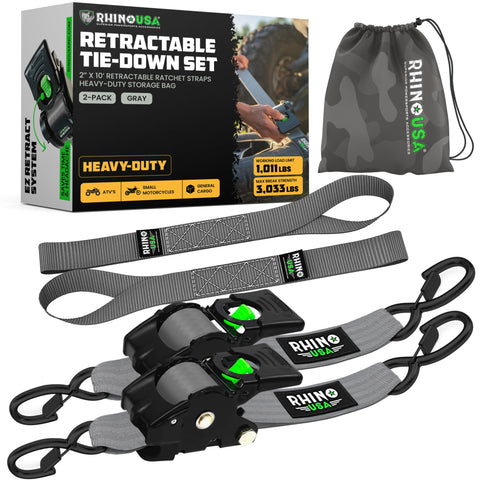 Rhino USA retractable ratchet strap secures cargo on a trailer with quick retraction.