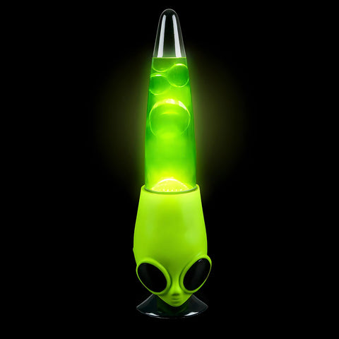 Rhode Island Novelty alien head lamp casting ambient colors across a desk