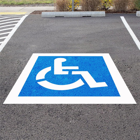 RoadAlchemist handicap stencil setup on pavement for precise ISA symbol and ADA compliance.