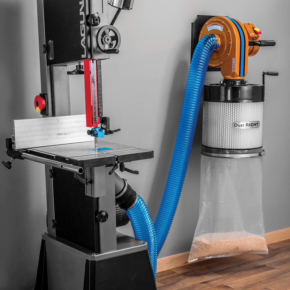 Rockler dust hose stored neatly after use on a magnet rack.