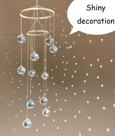 Rodudu spiral spinner mirror ball enhances ambience at celebrations.