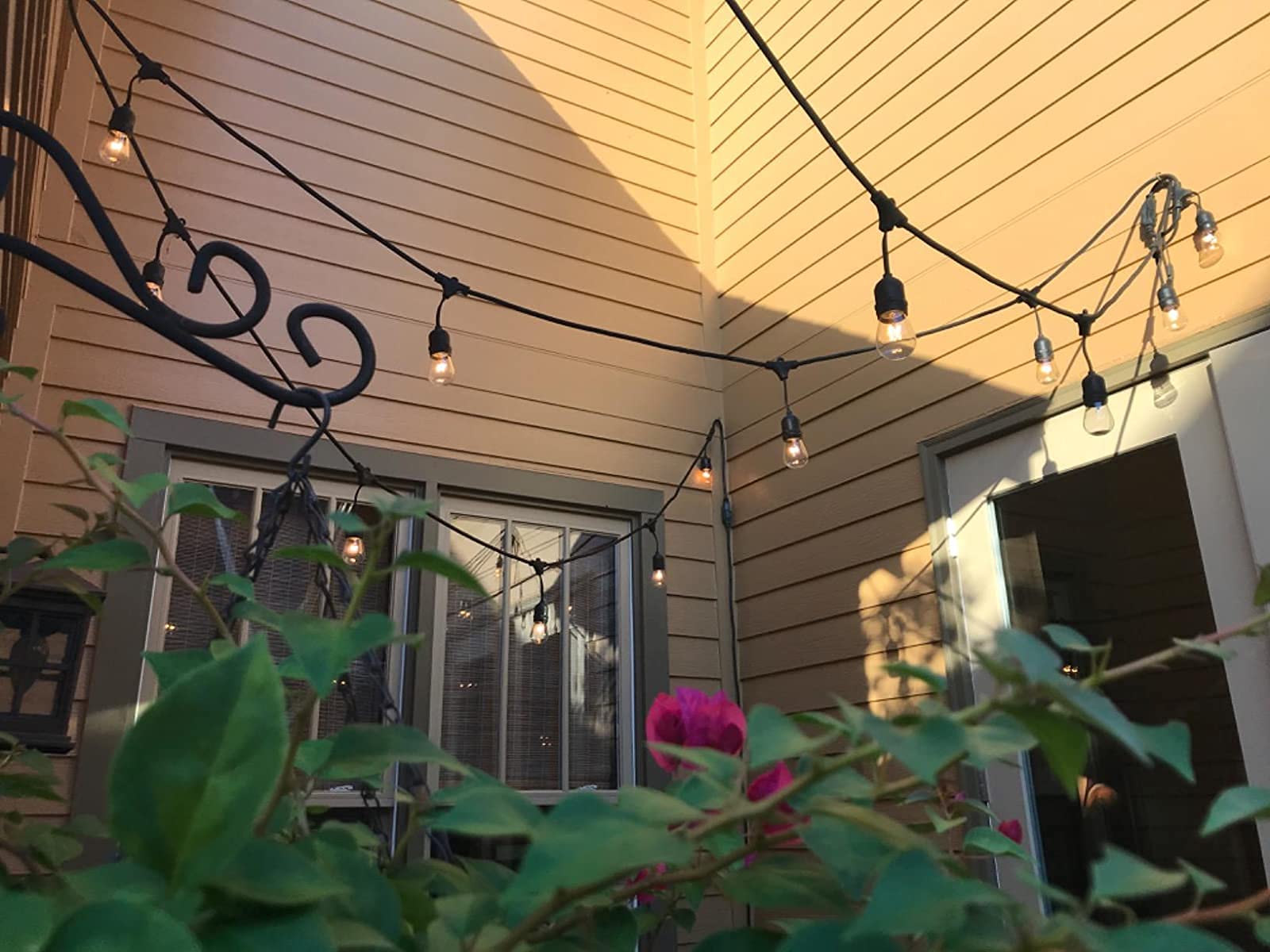Rolay amber-tinted glass outdoor bulb adds cozy glow to decks