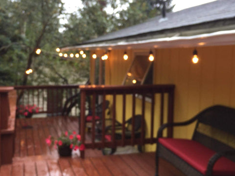 Rolay warm glow outdoor bulb enhances evening ambience