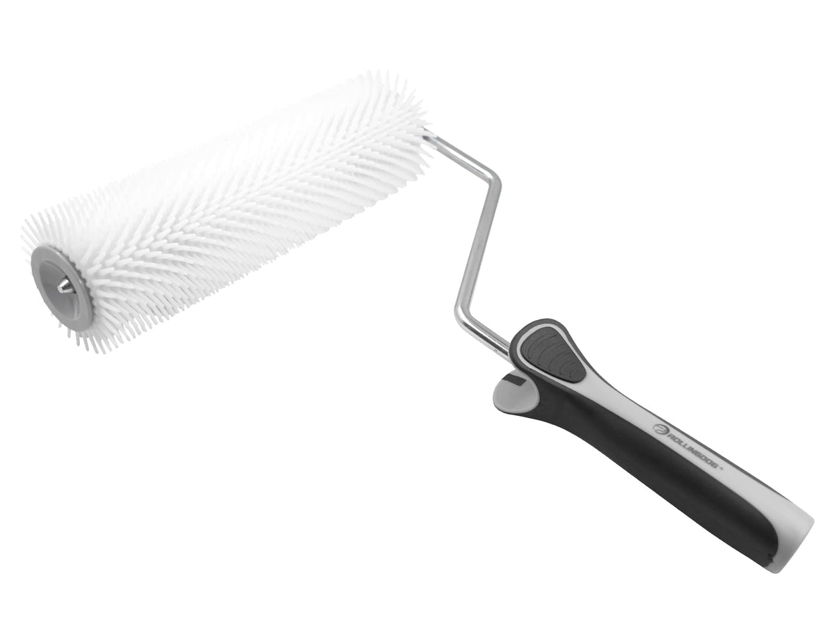 ROLLINGDOG 9-inch spike roller removes air bubbles on epoxy floors for a smoother finish