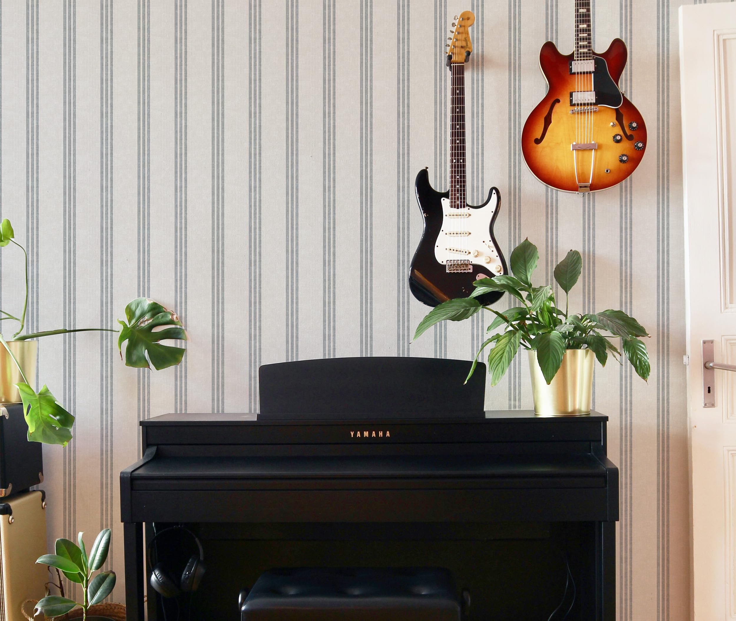 RollsRolla bathroom wall refresh with quick, removable wallpaper solution
