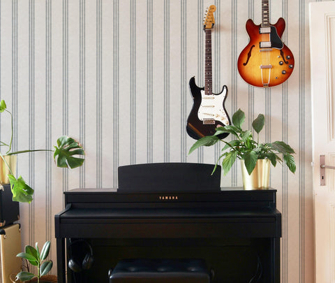 RollsRolla bathroom wall refresh with quick, removable wallpaper solution