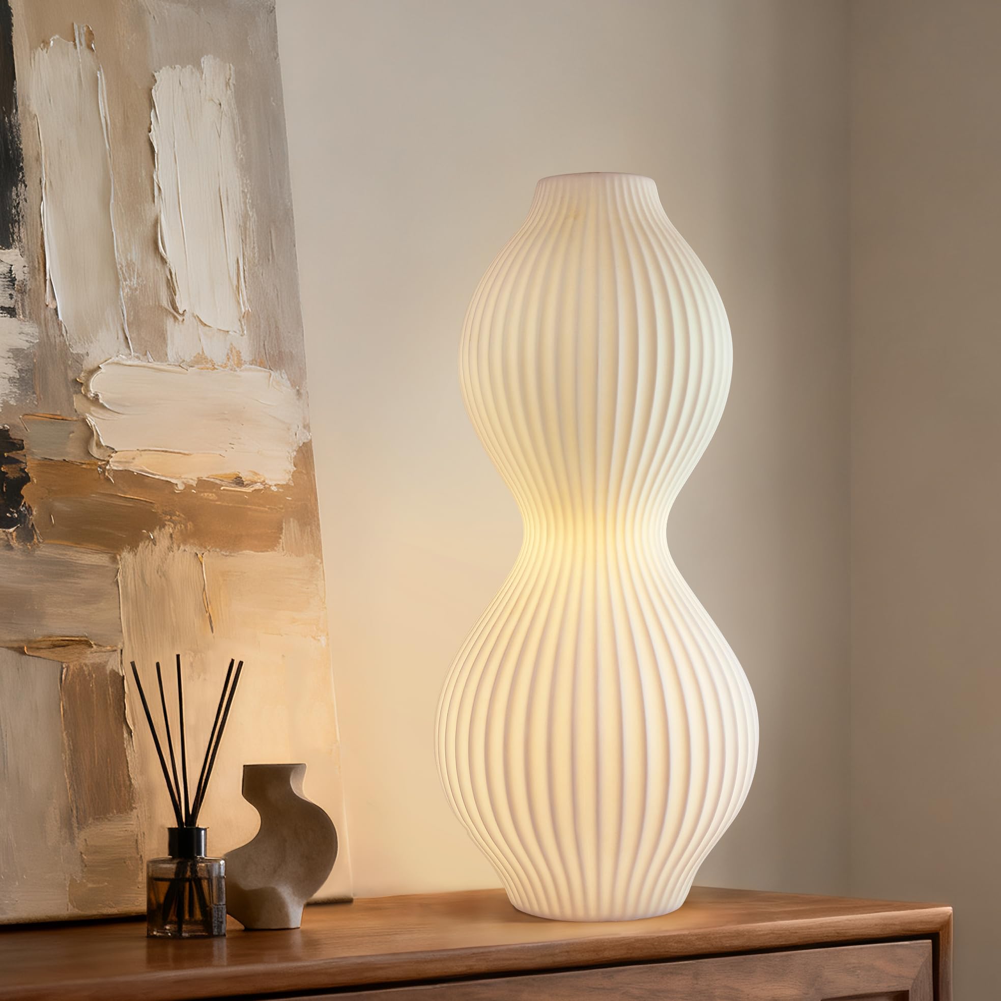 RONDURE ceramic table lamp side view for a cozy bedroom glow.
