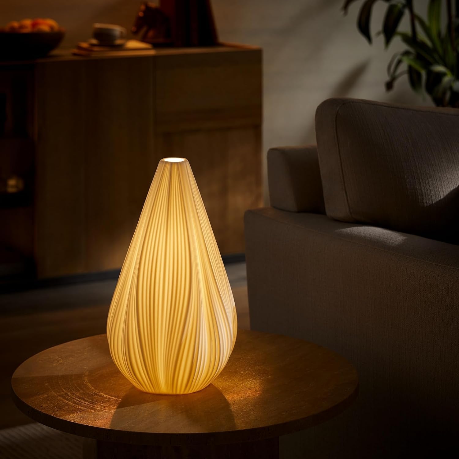 RONDURE lamp shade shows translucent ceramic for ambient light