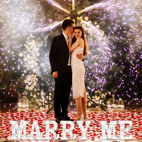 Roowest proposal night setup with petals and lights creates an intimate moment