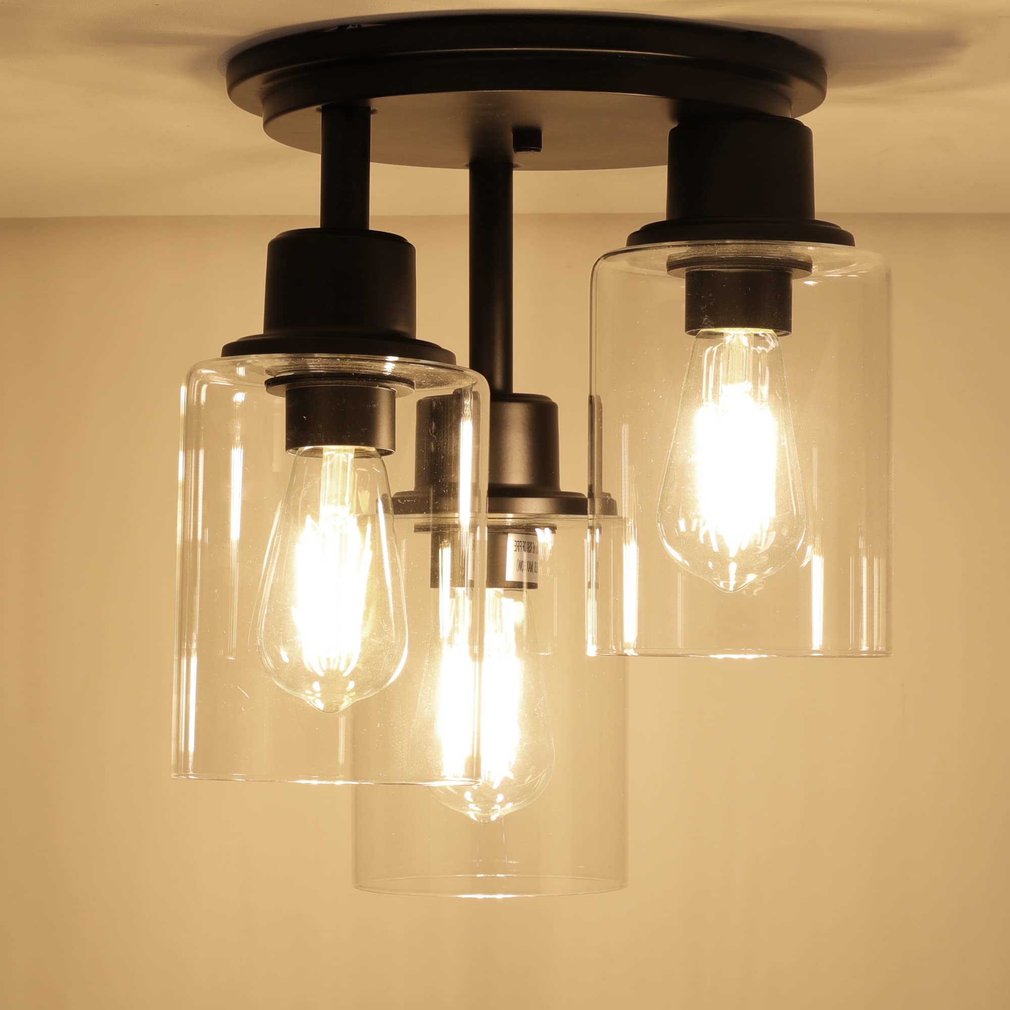 ROTTOGOON dining room fixture in oil-rubbed black pairs with various décors.
