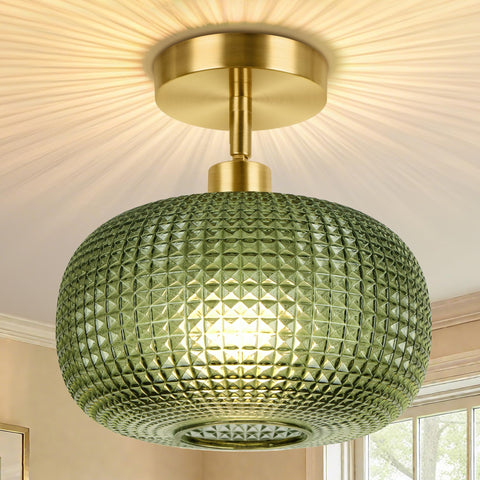 ROTTOGOON semi-flush mount with green glass shade enhances entryway ambience.