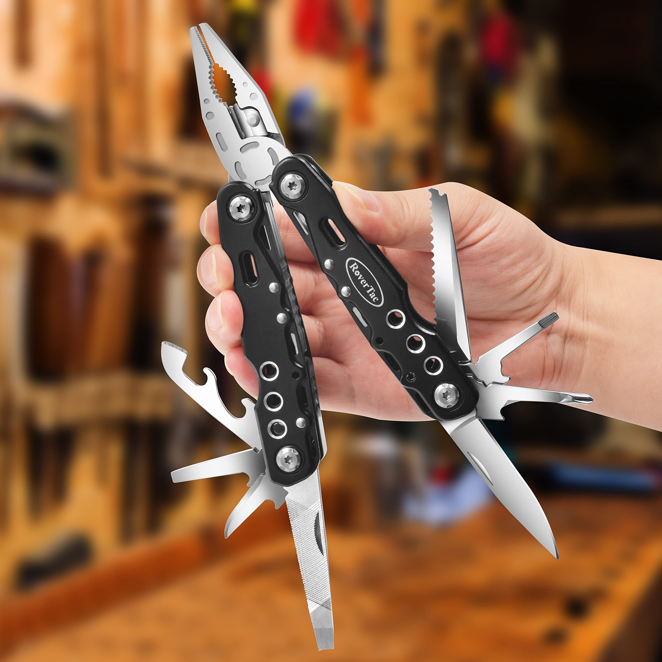 RoverTac multitool saw handles quick wood cuts on trail for campsite setup