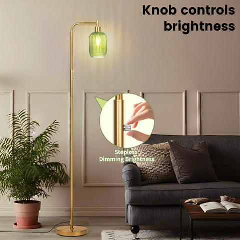 Ruiever green glass shade creates a warm, inviting glow.