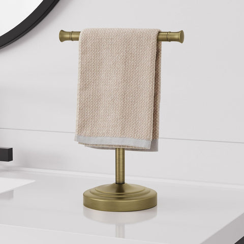 RUMOSE antique brass towel bar stand side view highlights compact footprint.