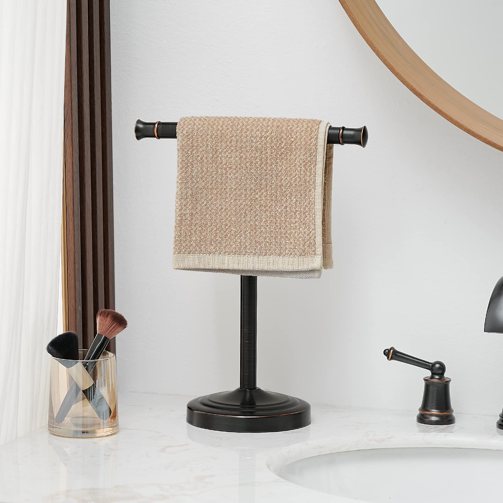 RUMOSE free-standing towel rack, side view highlighting stainless steel construction and bronze glow.