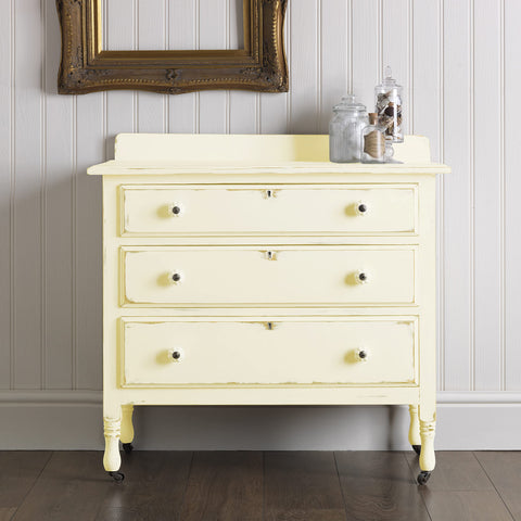 Rust-Oleum Chalked One-Coat Coverage bottle highlights quick furniture transform