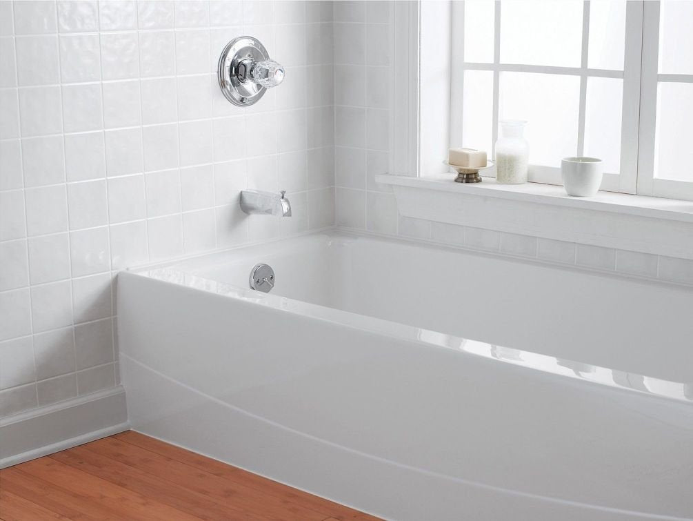 Rust-Oleum Tub and Tile Refinishing Kit brush strokes show easy renewal of bathroom surfaces.