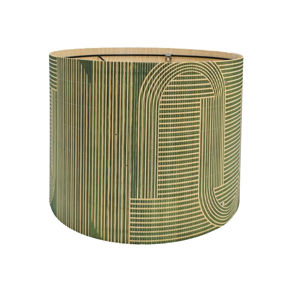 Rustic Bamboo Drum lamp shade with green geometric figure enhances cozy living room ambiance.