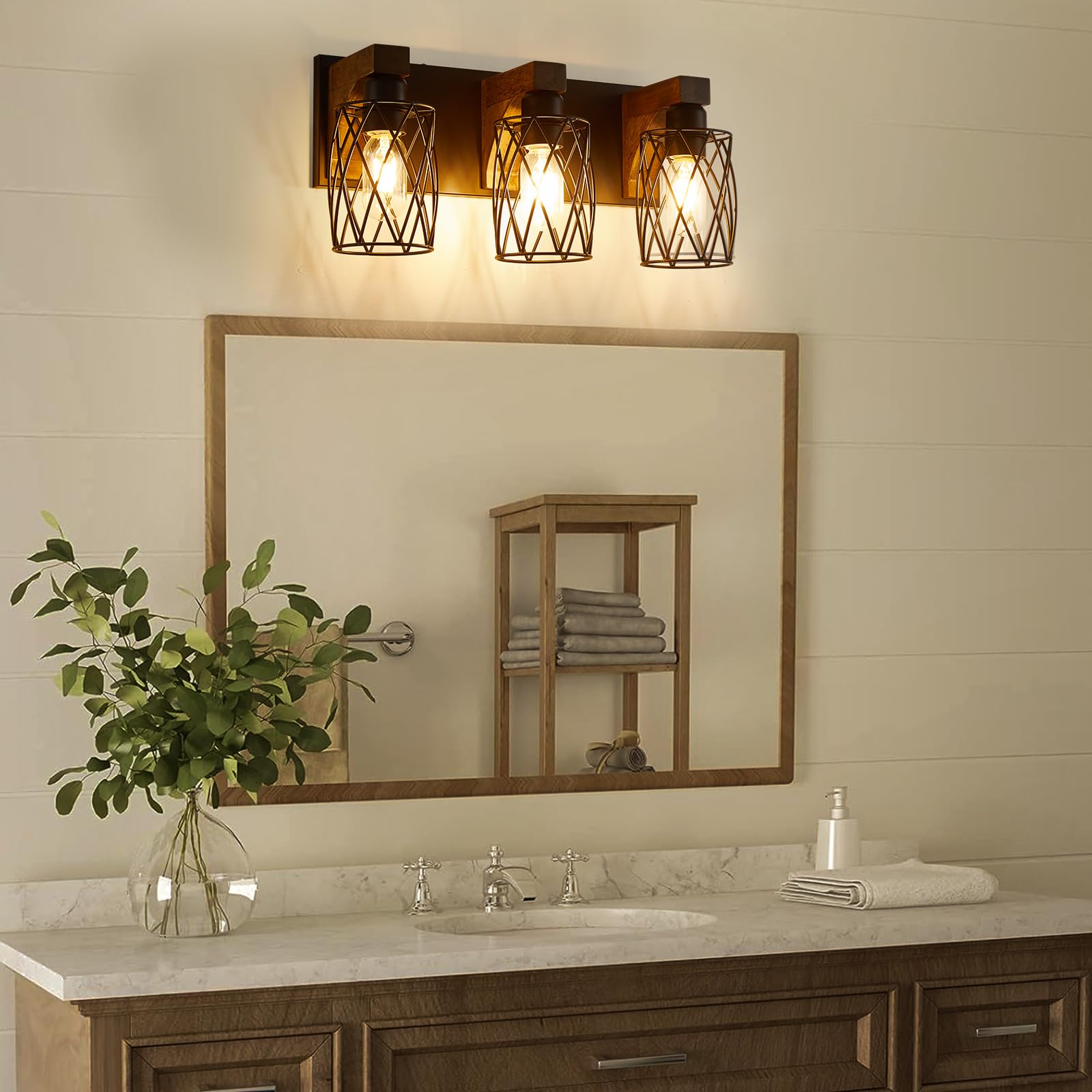 RVONOW 3-light vanity over mirror showing warm glow ideal for mornings.