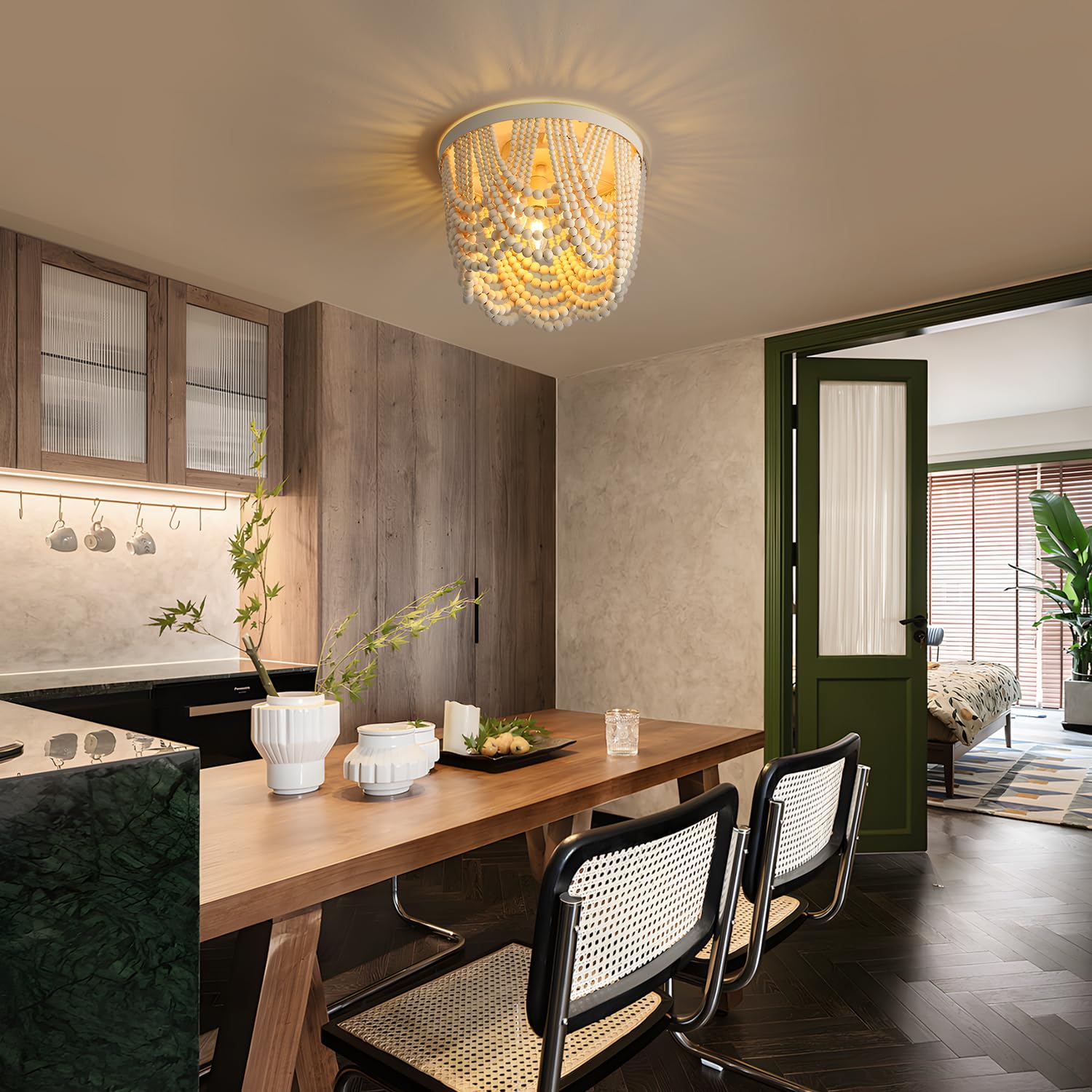 RyaHQ wood beaded chandelier enhances dining room with soft glow.