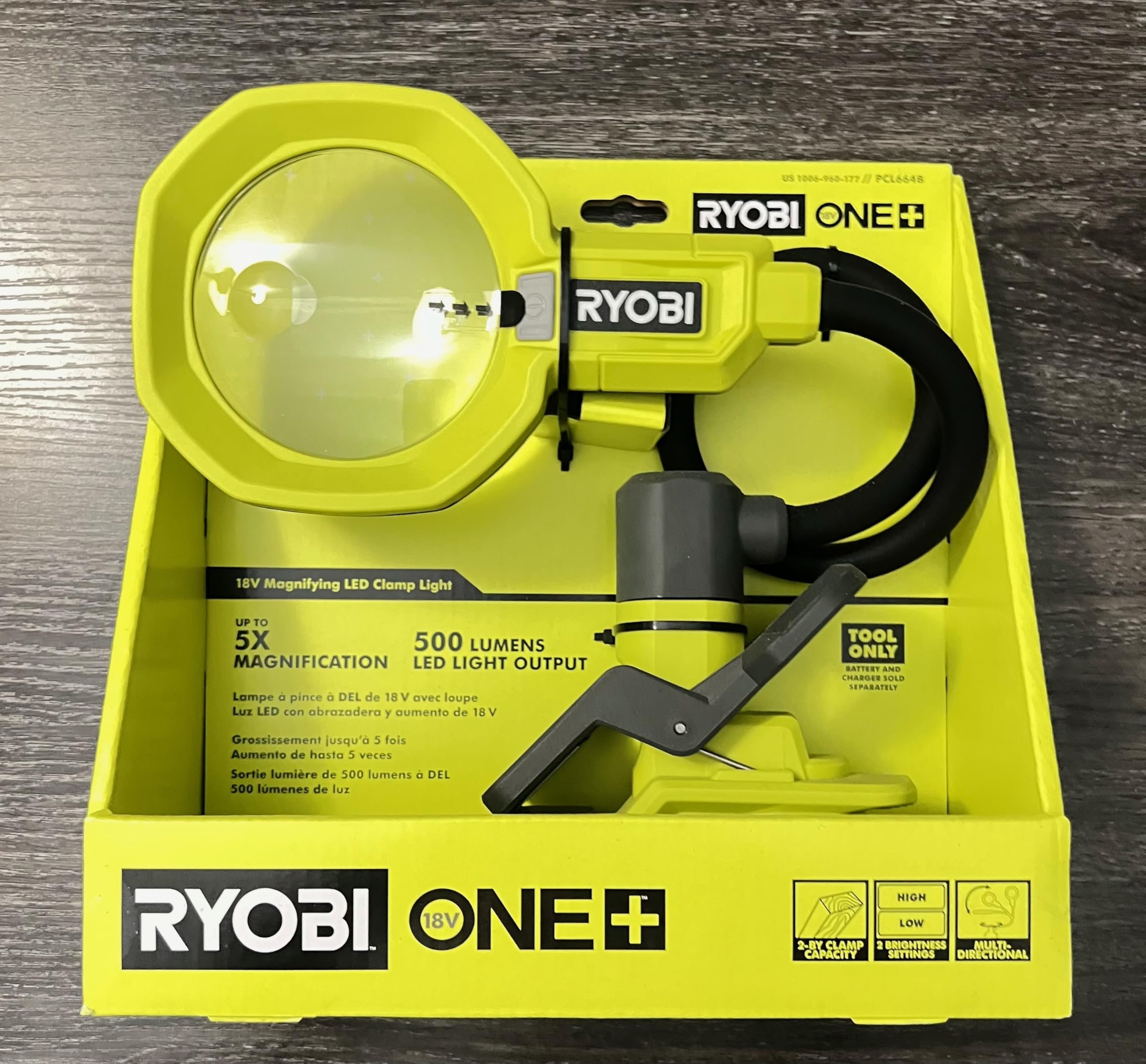 RYOBI ONE+ LED magnifying clamp light with 3.5-inch lens for precise inspection and hands-free illumination.