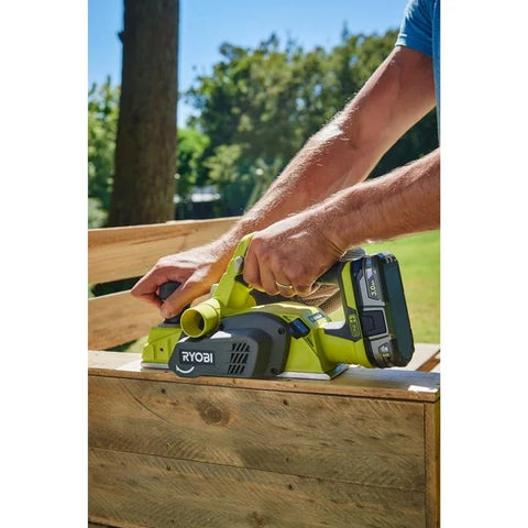 RYOBI P611 left-right chip exhaust option keeps workspace clean.