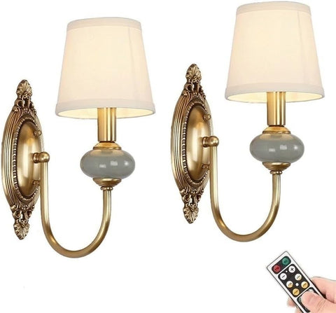 SADOVC wireless wall sconces with antique brass finish and green ceramic accents for flexible placement.
