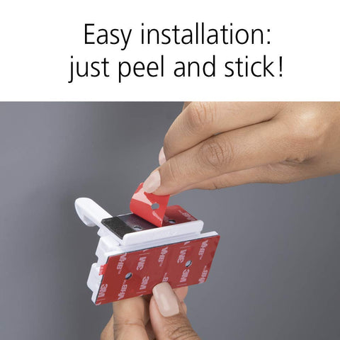 Safety 1st Adhesive Cabinet Latch on cabinet door keeps curious hands away.
