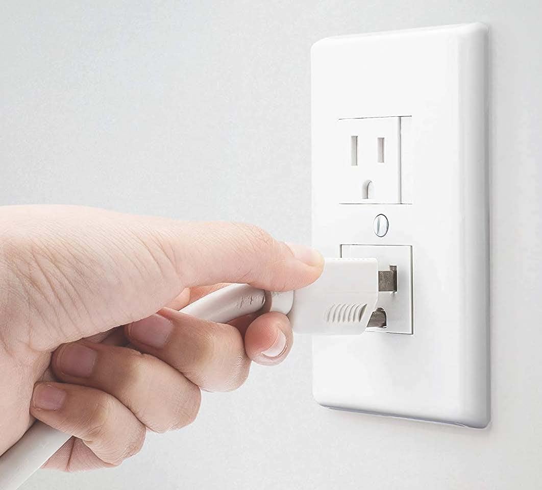 Safety Innovations oversized design hides outlet flaws for a neater look.