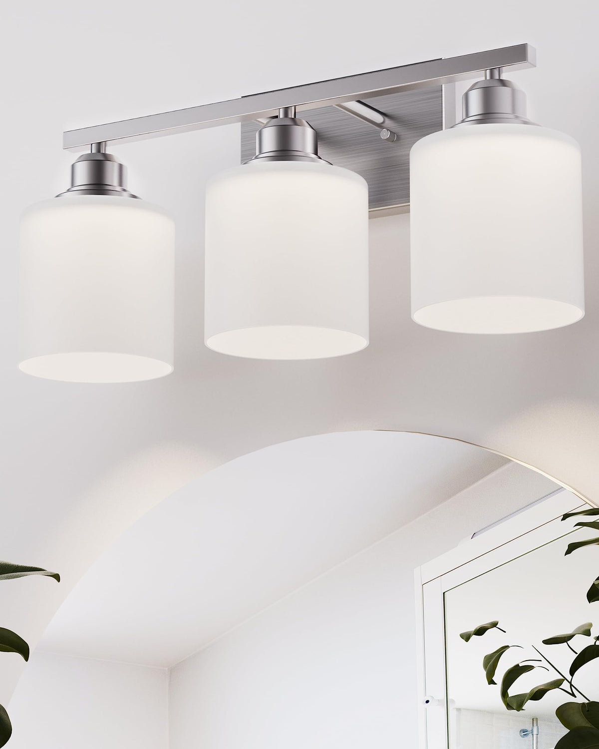 Sailstar 3-light vanity fixture over mirror with brushed nickel finish for soft, even brightness.