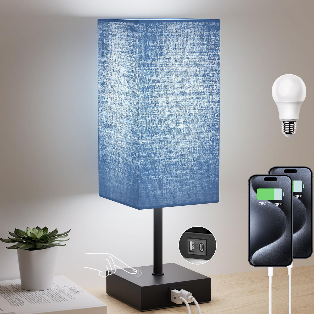 Sailstar bedside lamp with navy shade and black base for elegant nightstand decor.