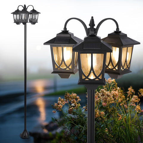 SAKSIAPRO 3-head solar lamp post lights the garden path with warm 3000K glow.