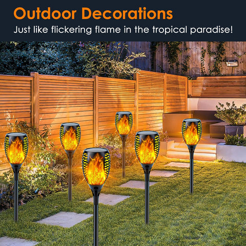 Sanjicha six-pack solar torch lights illuminate pathways with flickering realism.